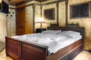 Llit o llits en una habitació de Penzion Gaudeamus