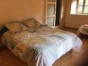 Postel nebo postele na pokoji v ubytování Mas Graffouil