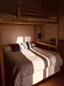 Ein Bett oder Betten in einem Zimmer der Unterkunft La Torta Di Mele