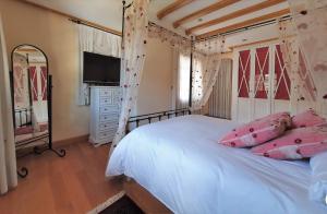 Posteľ alebo postele v izbe v ubytovaní Casa familiar con jardín “Arana Etxea” EBI01207