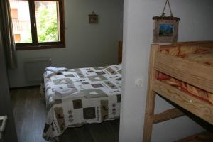 Postel nebo postele na pokoji v ubytování Gîte Châtel