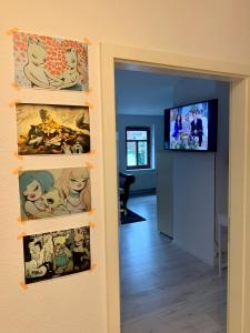 TV a/nebo společenská místnost v ubytování Hinterhaus Apartment No3