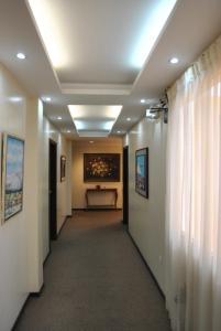 TV a/nebo společenská místnost v ubytování Hotel Makroz