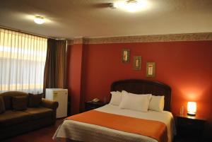 Postel nebo postele na pokoji v ubytování Hotel Makroz