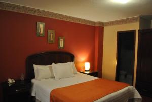Postel nebo postele na pokoji v ubytování Hotel Makroz