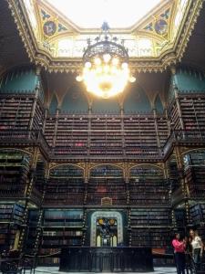 a large library with a chandelier in a building at Lapa Casa Hostel in Rio de Janeiro