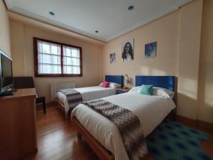 Posteľ alebo postele v izbe v ubytovaní Casa familiar con jardín “Arana Etxea” EBI01207
