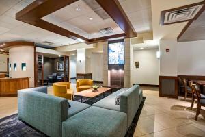 a lobby of a hospital with couches and chairs at Hyatt Place Richmond - Innsbrook in Short Pump