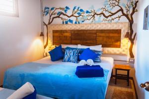 מיטה או מיטות בחדר ב-Hotel boutique STAY Provenza