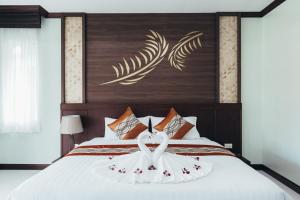 Cama o camas de una habitación en Palm Kiri Aonang Resort