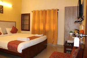 Afbeelding uit fotogalerij van Kaveri Hotel Bed & Breakfast in Mysore