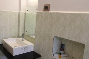 Kupaonica u objektu Kaveri Hotel Bed & Breakfast