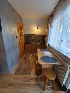 Fotografia z galérie ubytovania Pokoje i Apartamenty Regionalny Styl ul Króle 1a Zakopane v Zakopanom