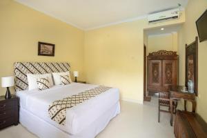 Voodi või voodid majutusasutuse Diana Hotel Jogja toas