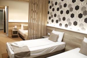 Postel nebo postele na pokoji v ubytování Student Hotel Mostar