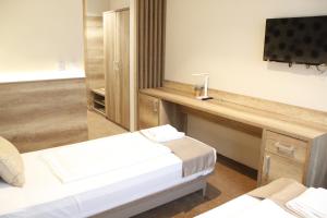 Voodi või voodid majutusasutuse Student Hotel Mostar toas