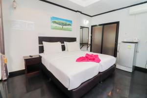 Postel nebo postele na pokoji v ubytování Sinsamut Koh Samed
