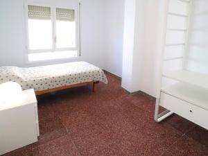 Posteľ alebo postele v izbe v ubytovaní Nou xaica apartamento per 6 personas con vista a mar Ref D23002