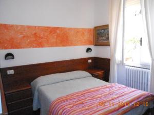 Postel nebo postele na pokoji v ubytování Albergo Villagrande