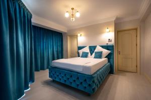 Postel nebo postele na pokoji v ubytování Hotel Casa Fiori