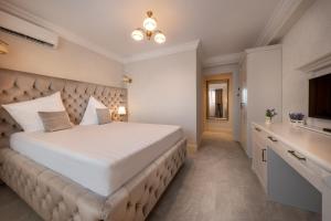 Postel nebo postele na pokoji v ubytování Hotel Casa Fiori