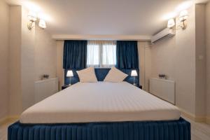 Postel nebo postele na pokoji v ubytování Hotel Casa Fiori