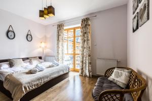 Posteľ alebo postele v izbe v ubytovaní Apartament Górski Deluxe Odkryj Zakopane