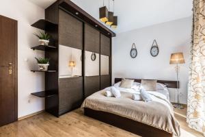 Łóżko lub łóżka w pokoju w obiekcie Apartament Górski Deluxe Odkryj Zakopane