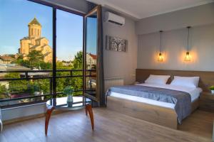 Postel nebo postele na pokoji v ubytování Hotel Livin