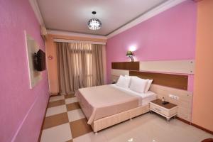 Postel nebo postele na pokoji v ubytování Hotel Chao