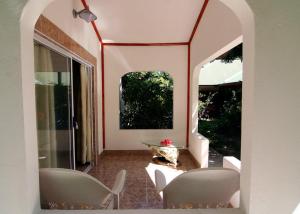 Posezení v ubytování Rising Sun Guesthouse