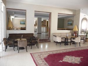 
The lounge or bar area at HOTEL KAMAL CITY CENTER
