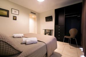 Posteľ alebo postele v izbe v ubytovaní Hotel Montmar