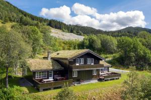 an aerial view of a house in the mountains at Spacious cabin in Hemsedal, 8 bedrooms and sauna in Hemsedal