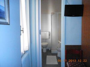 Koupelna v ubytování Albergo Villagrande