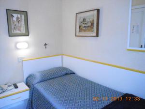 Postel nebo postele na pokoji v ubytování Albergo Villagrande