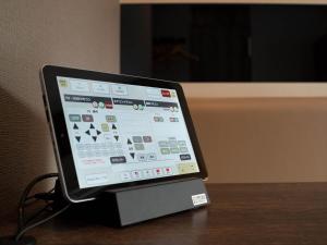 TV a/nebo společenská místnost v ubytování Super Hotel Premier Saitama Higashiguchi