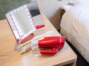 Postel nebo postele na pokoji v ubytování Super Hotel Premier Saitama Higashiguchi