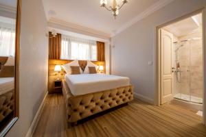 Postel nebo postele na pokoji v ubytování Hotel Casa Fiori