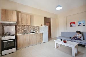 Kuchyň nebo kuchyňský kout v ubytování Sfakia Thea Apartments