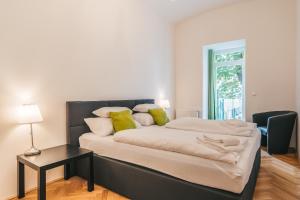 Ein Bett oder Betten in einem Zimmer der Unterkunft Duschel Apartments Imperial Living