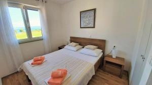 Posteľ alebo postele v izbe v ubytovaní Apartment Ribnjak 10