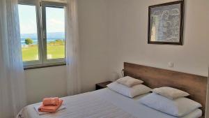 Posteľ alebo postele v izbe v ubytovaní Apartment Ribnjak 10