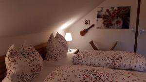 En eller flere senge i et værelse på Harz Blick