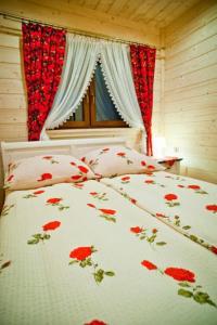 Posteľ alebo postele v izbe v ubytovaní Domek Deluxe Resort Willa Adrian