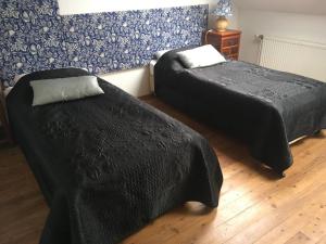 Letto o letti in una camera di Villa Berging