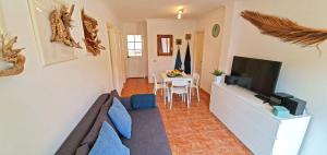 Televízia a/alebo spoločenská miestnosť v ubytovaní Ferienhaus CASA CRISTOF - Costa Calma - Glasfaserinternet - max 6 Personen