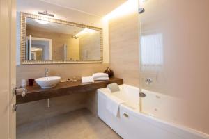 Koupelna v ubytování Hotel Patavium
