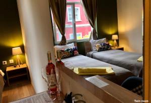 Postel nebo postele na pokoji v ubytování SKYLER GUEST HOUSE