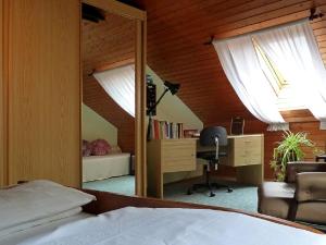 Кровать или кровати в номере Ferienwohnungen Vesteblick